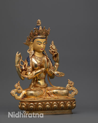 Side view of Chenrezig statue with carved swirling robe and patterned garments
