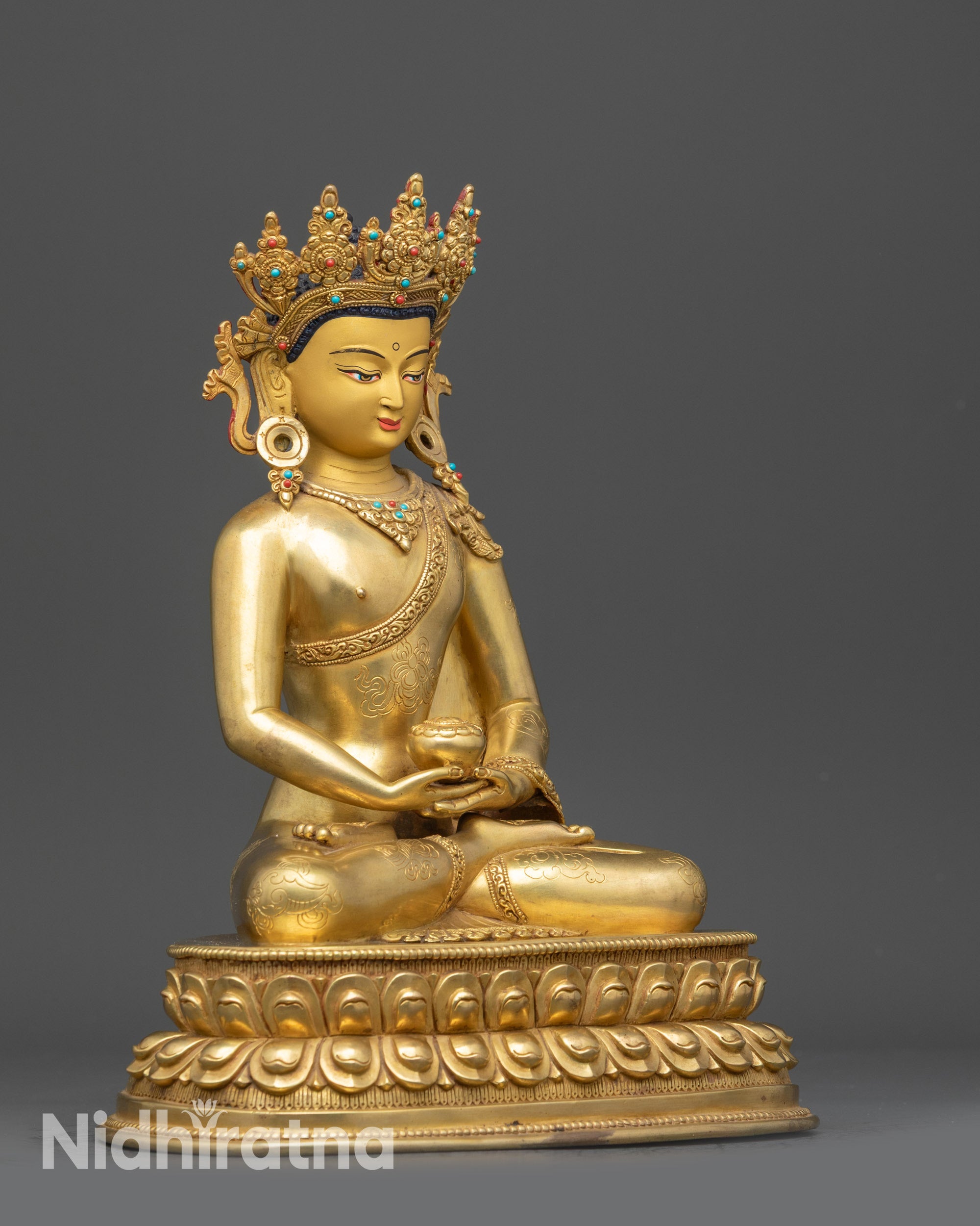 Side view of Crowned Amitabha Buddha Statue holding monk's bowl in dhyana mudra
