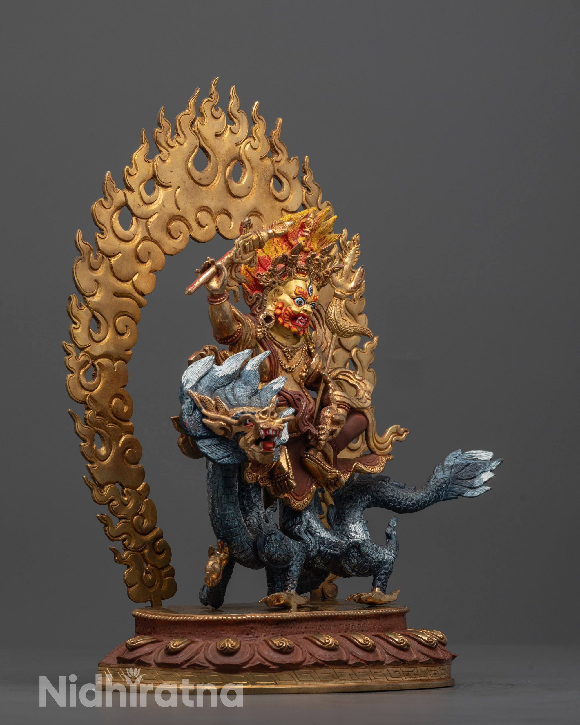 Side view of Detailed view of White Dzambhala Statue’s lotus base with legendary dragon beneath