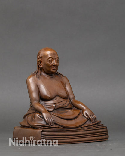 Side view of Dilgo Khyentse Rinpoche statue with chemically oxidized antique finish