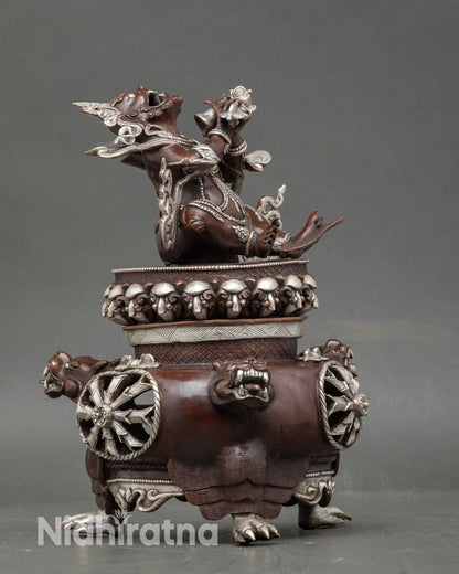 Side view of Dorje Khandro incense burner with intricate protective motifs and sacred ornamentation