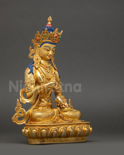 Side view of Dorje Sempa Buddhist statue with semi-precious stone adornments