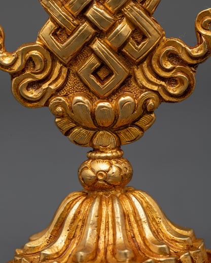 Side view of Endless Knot symbol handcrafted Buddhist copper talisman