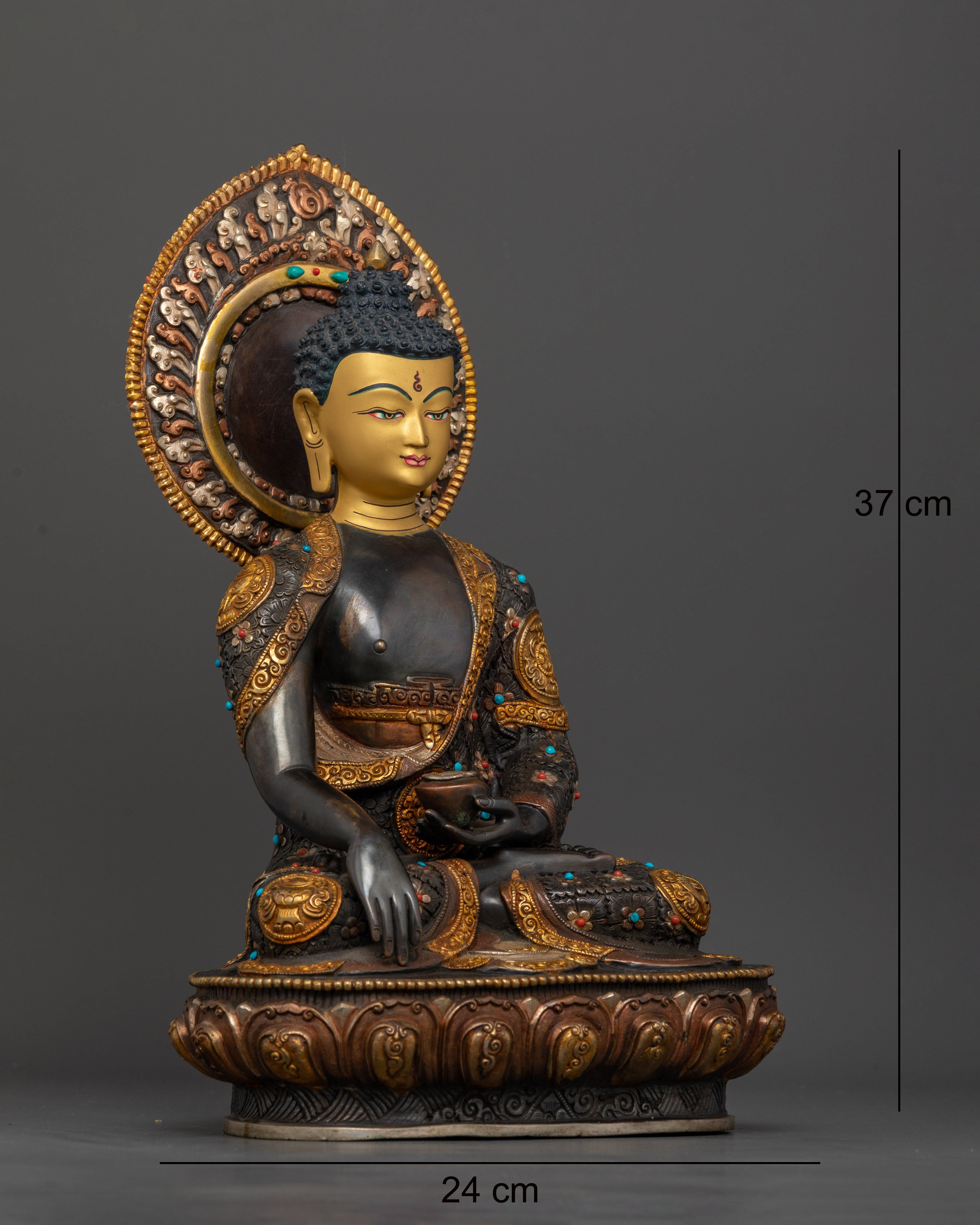 Side view of Enlightened Buddha sculpture seated on lotus throne with sacred adornments