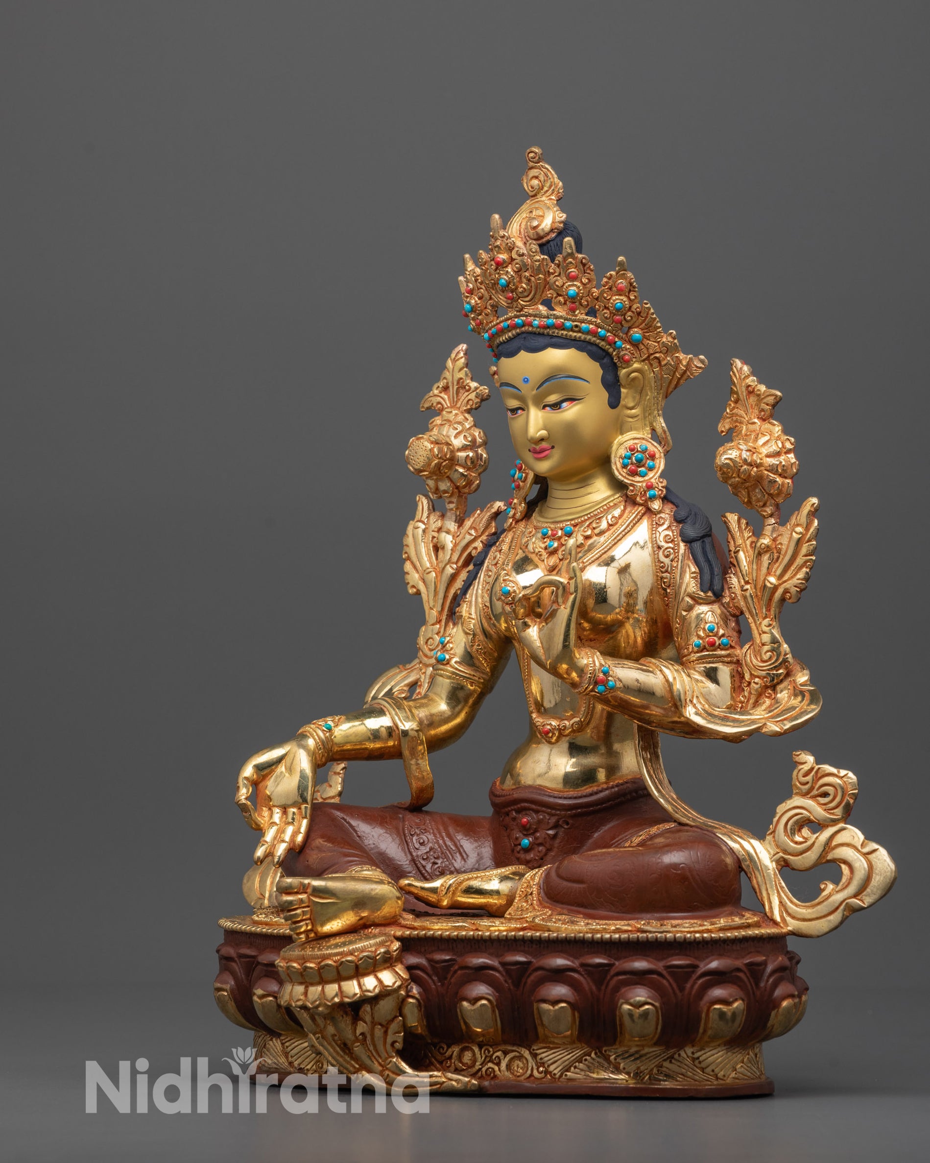 Side view of Green Tara Statue with hollow chamber for consecration carved using lost-wax method