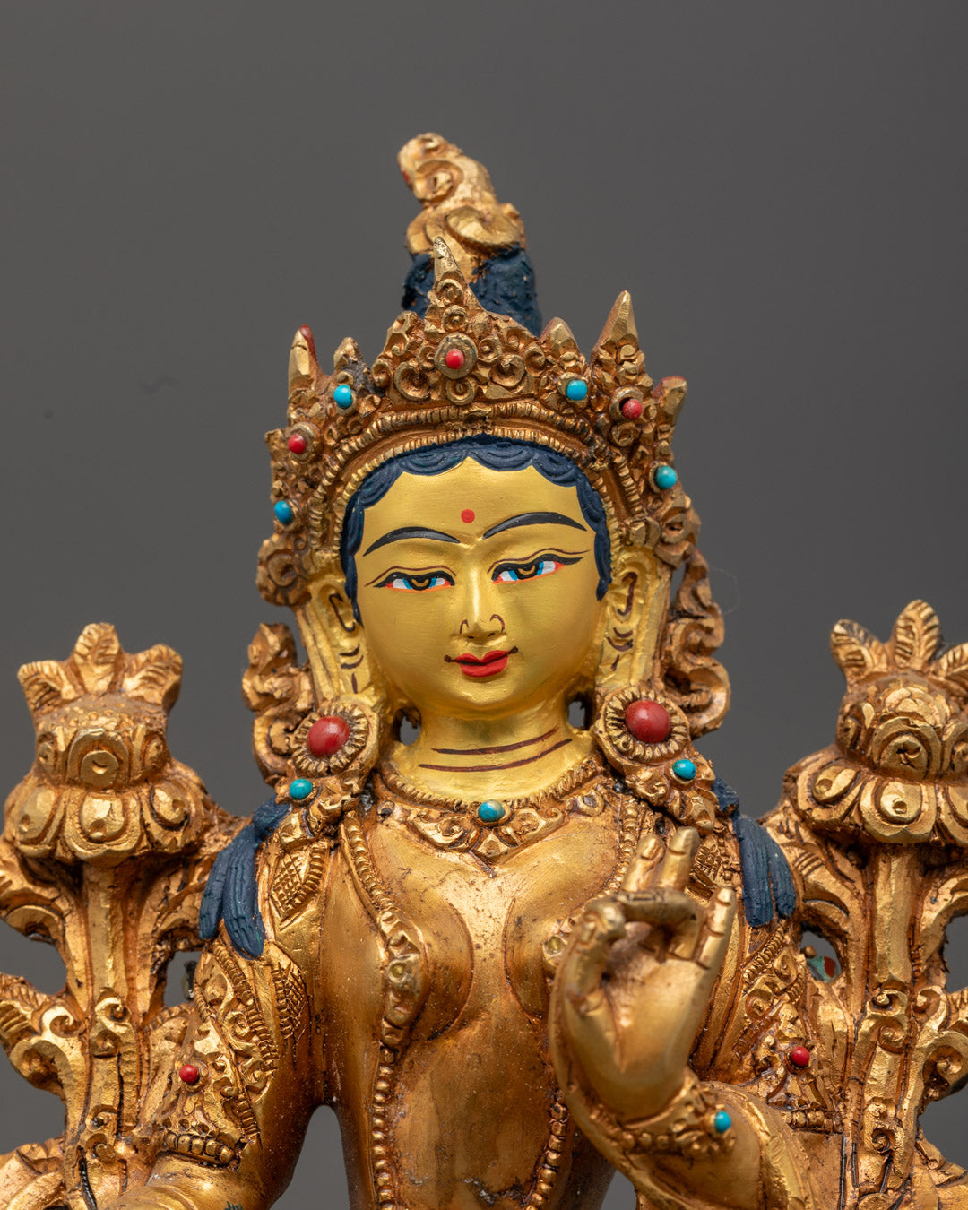 Green Tara statue with hollow base designed for inserting auspicious mantras or relics for meditation focus
