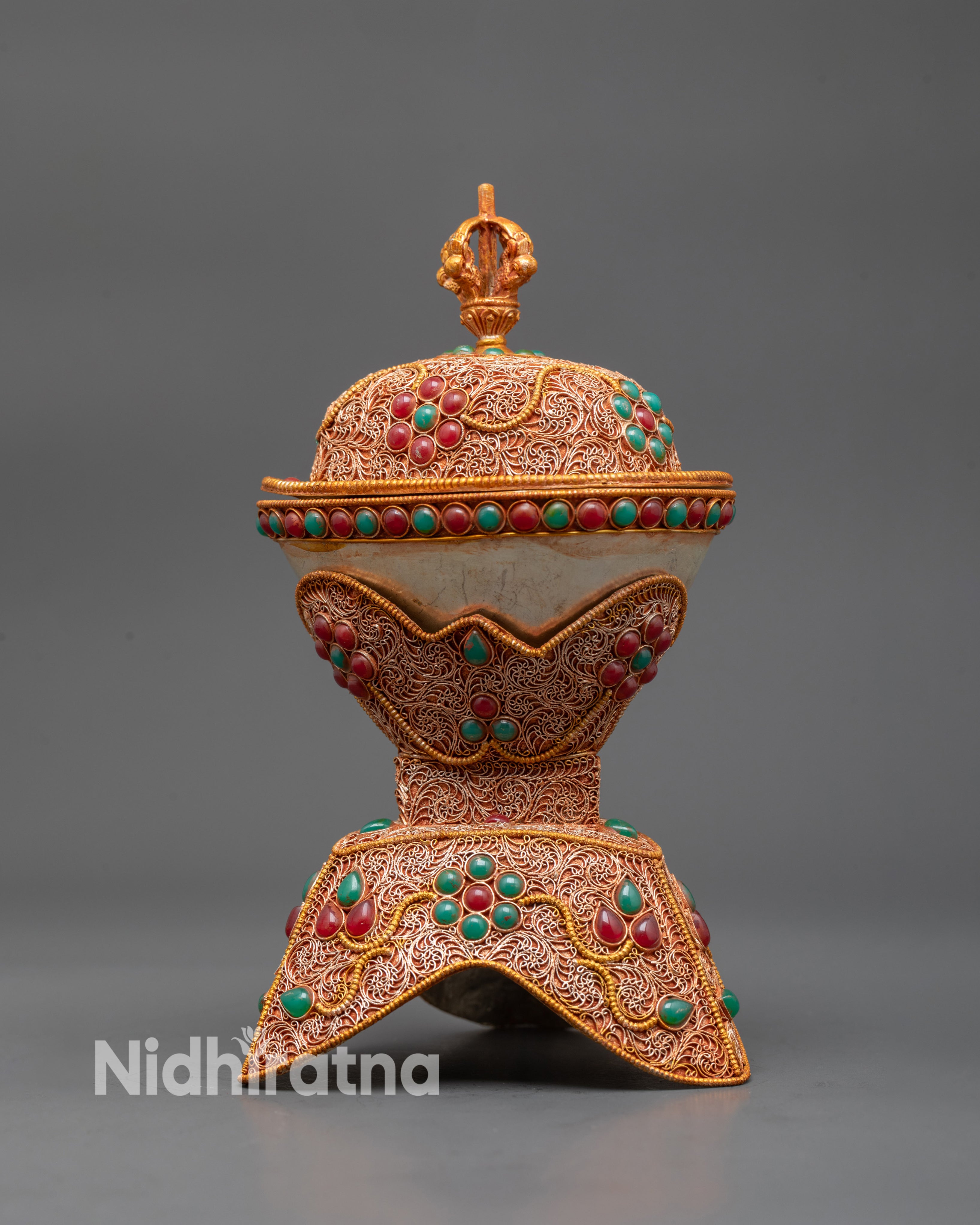 Side view of Handcrafted Kapala with dual-section structure and gold-plated half vajra lid
