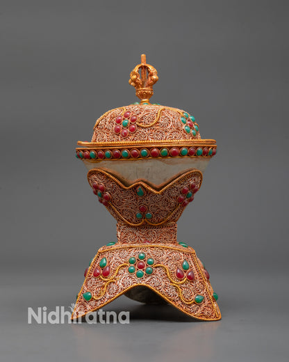 Side view of Handcrafted Kapala with dual-section structure and gold-plated half vajra lid
