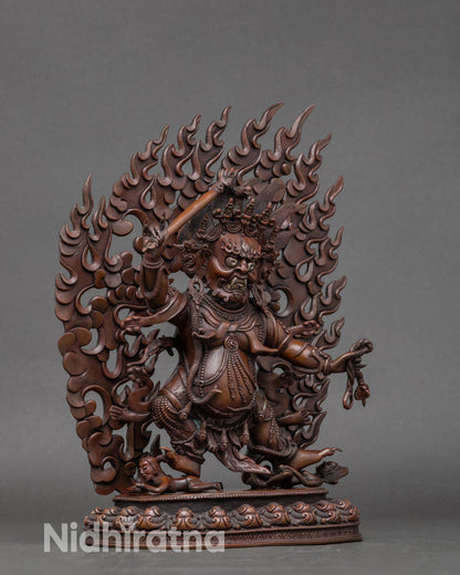 Side view of Hayagriva Bodhisattva sculpture subduing human figures, traditional Nepalese craft