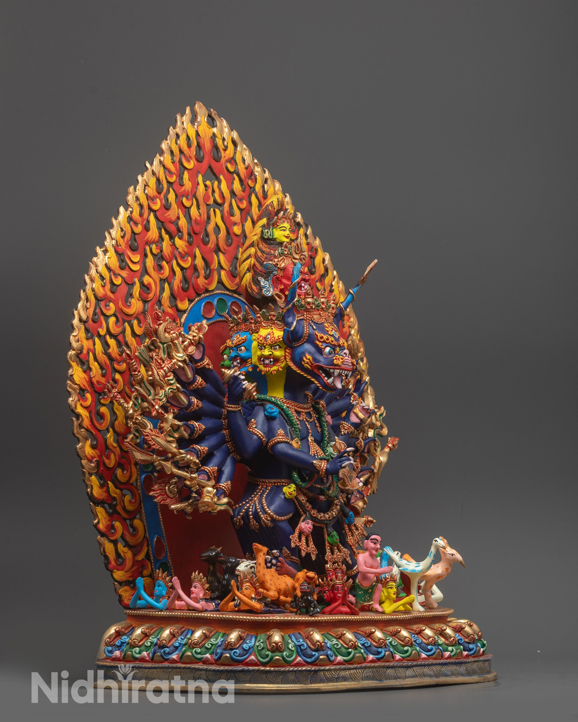 Side view of Himalayan Yamantaka Statue with lotus seat and subjugated figure visible