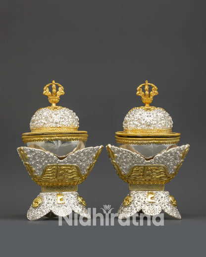 Side view of Kapala set displaying dual-section silver and gold filigree pattern