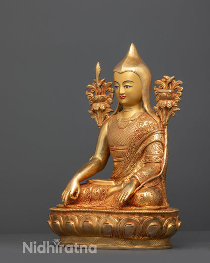 Side view of Longchenpa Statue displaying detailed robes, lotus seat