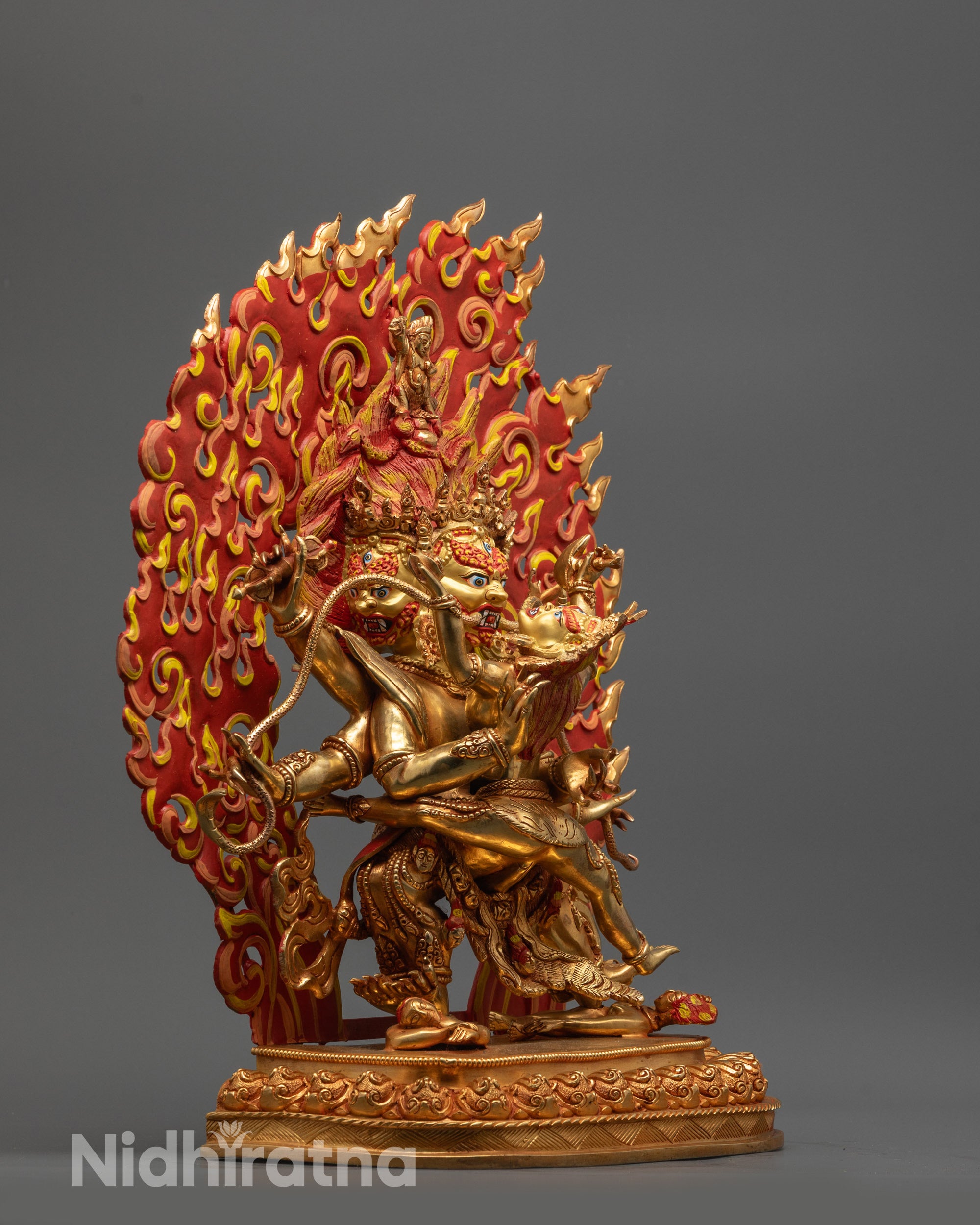 Side view of Mahachakra Vajrapani Consort Statue depicting tiger skin garment and lotus seat