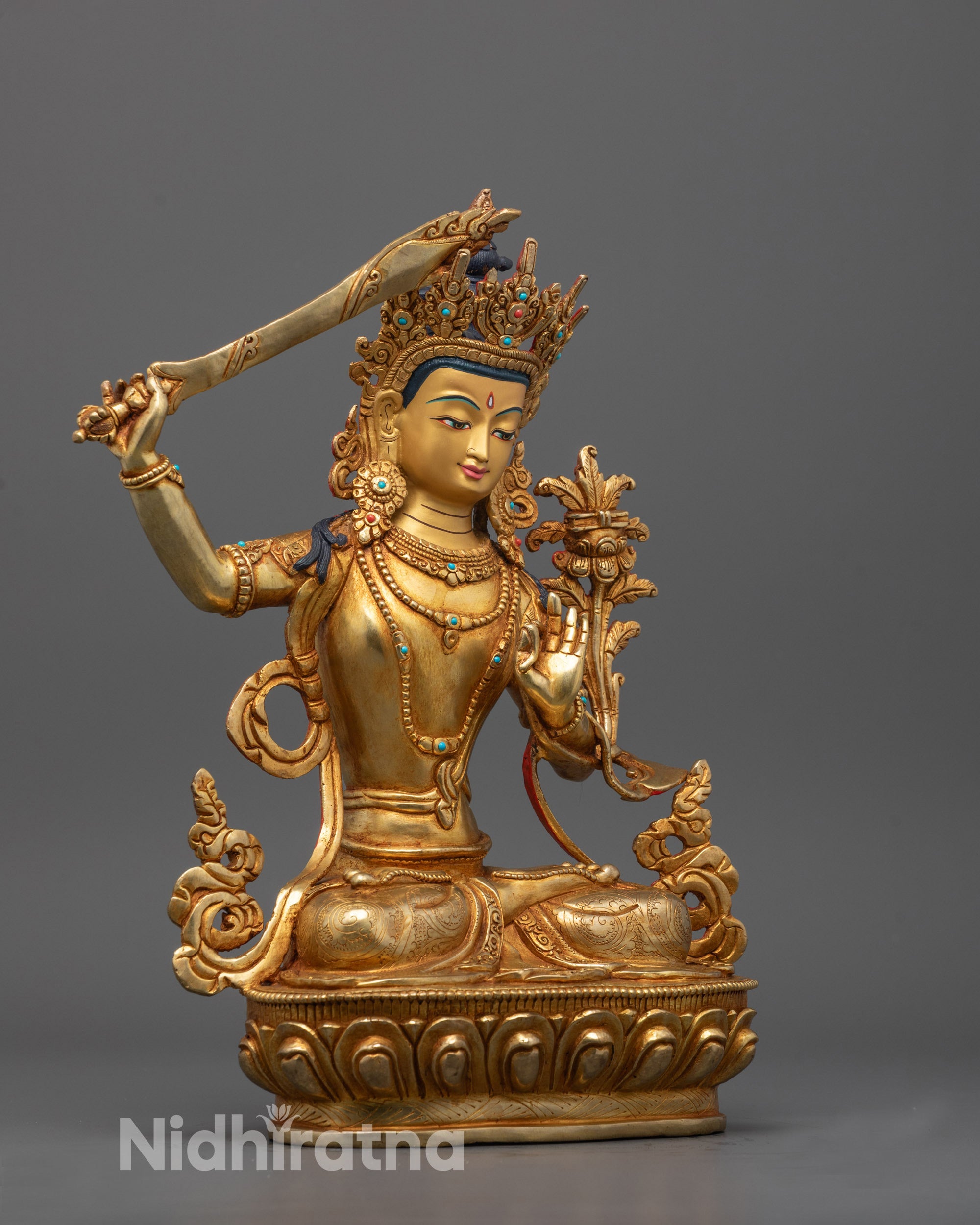 Side view of Manjushri statue showing consecration chamber