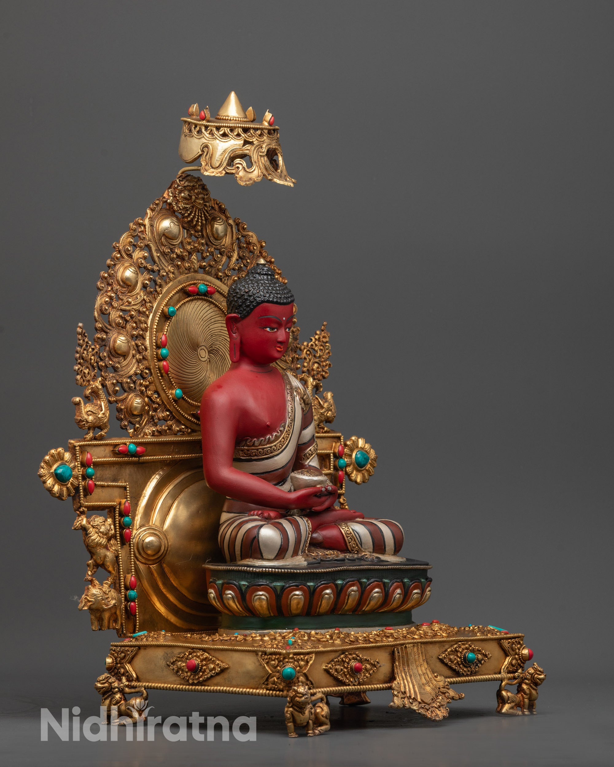 Side view of Nepalese Amitabha Buddha sculpture in Bhumisparsha Mudra