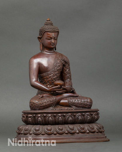 Side view of Nepalese Amitabha Buddha statue showing detailed lotus throne and alms bowl