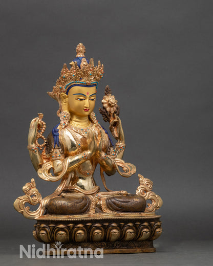 Side view of Nepalese Avalokiteshvara statue, lost-wax copper craftsmanship detail