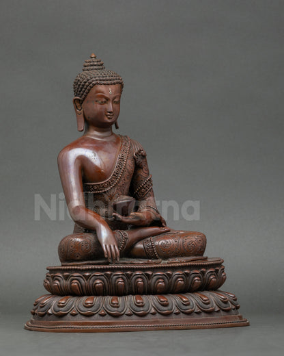 Side view of Nepalese Buddha Shakyamuni statue, traditional lost-wax craftsmanship