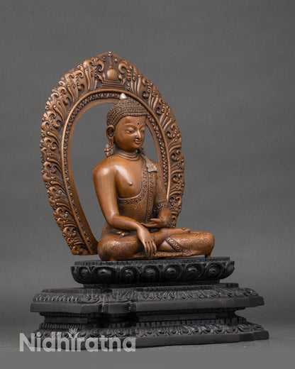 Side view of Nepalese Buddha meditation statue on uplifted lotus flower pedestal
