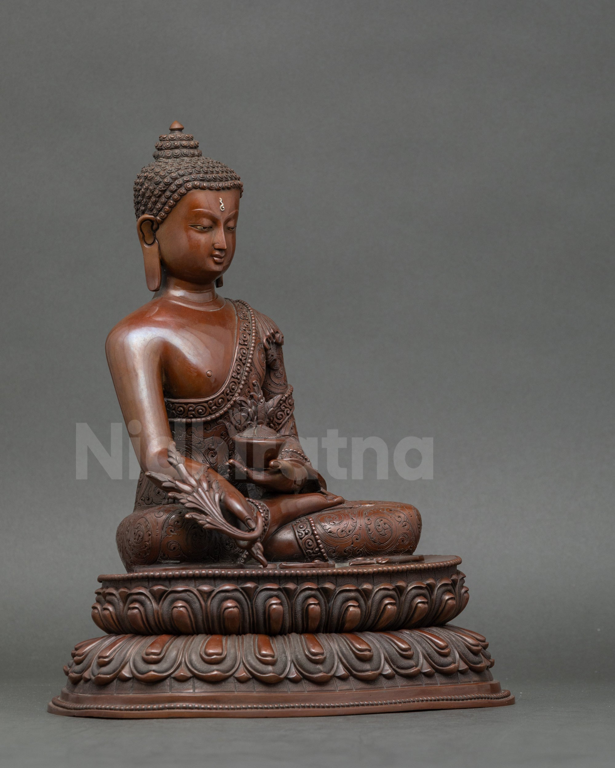Side view of Nepalese Healing Buddha statue, artisan lost-wax craftsmanship