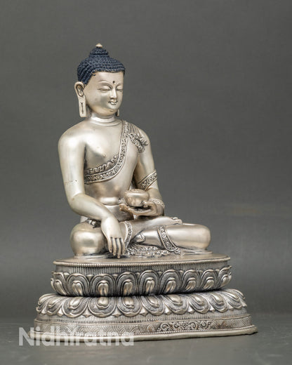 Side view of Nepalese Shakyamuni Buddha statue with vibrant acrylic colors