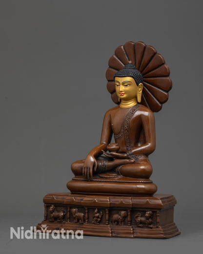 Side view of Nepalese handcrafted Shakyamuni Buddha in monk robe holding begging bowl