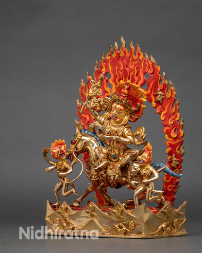 Side view of Palden Lhamo protector goddess statue with flaming halo and sacred parasol