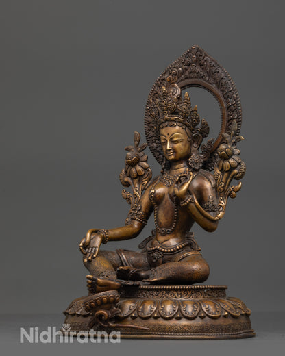 Side view of Premium Green Tara Statue in royal ease posture with lotus seat and halo