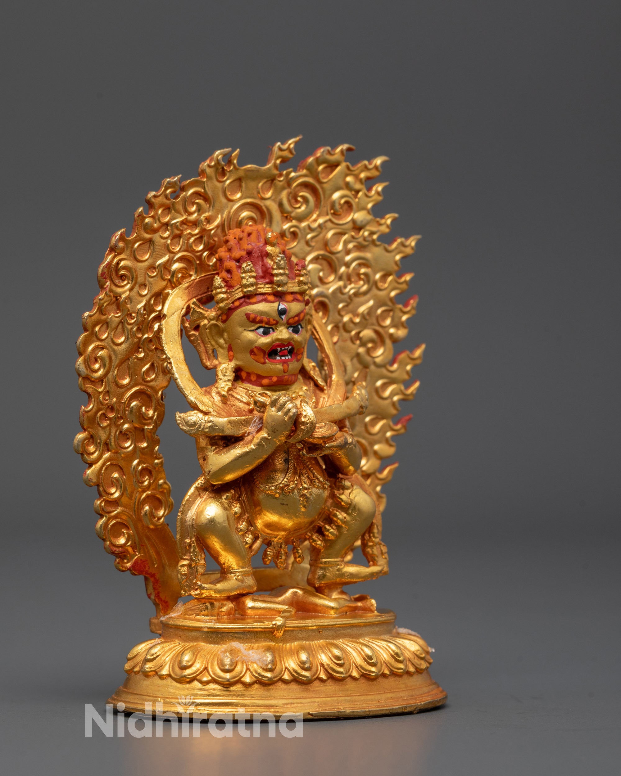 Side view of Sakya Mahakala Statue highlighting the lotus base and hollow chamber