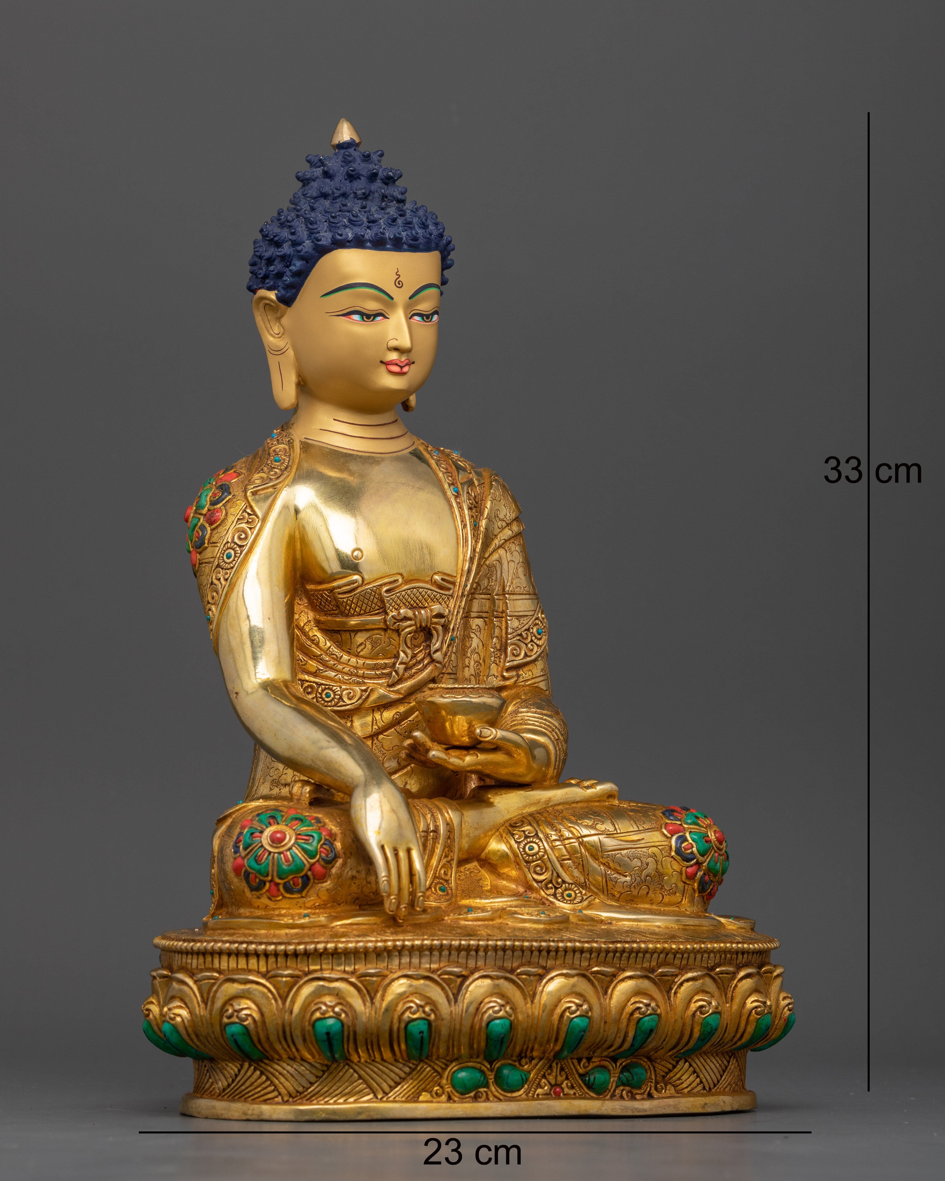 Side view of Sakyamuni Buddha statue on ornate pedestal with Bhumisparsha Mudra hand gesture