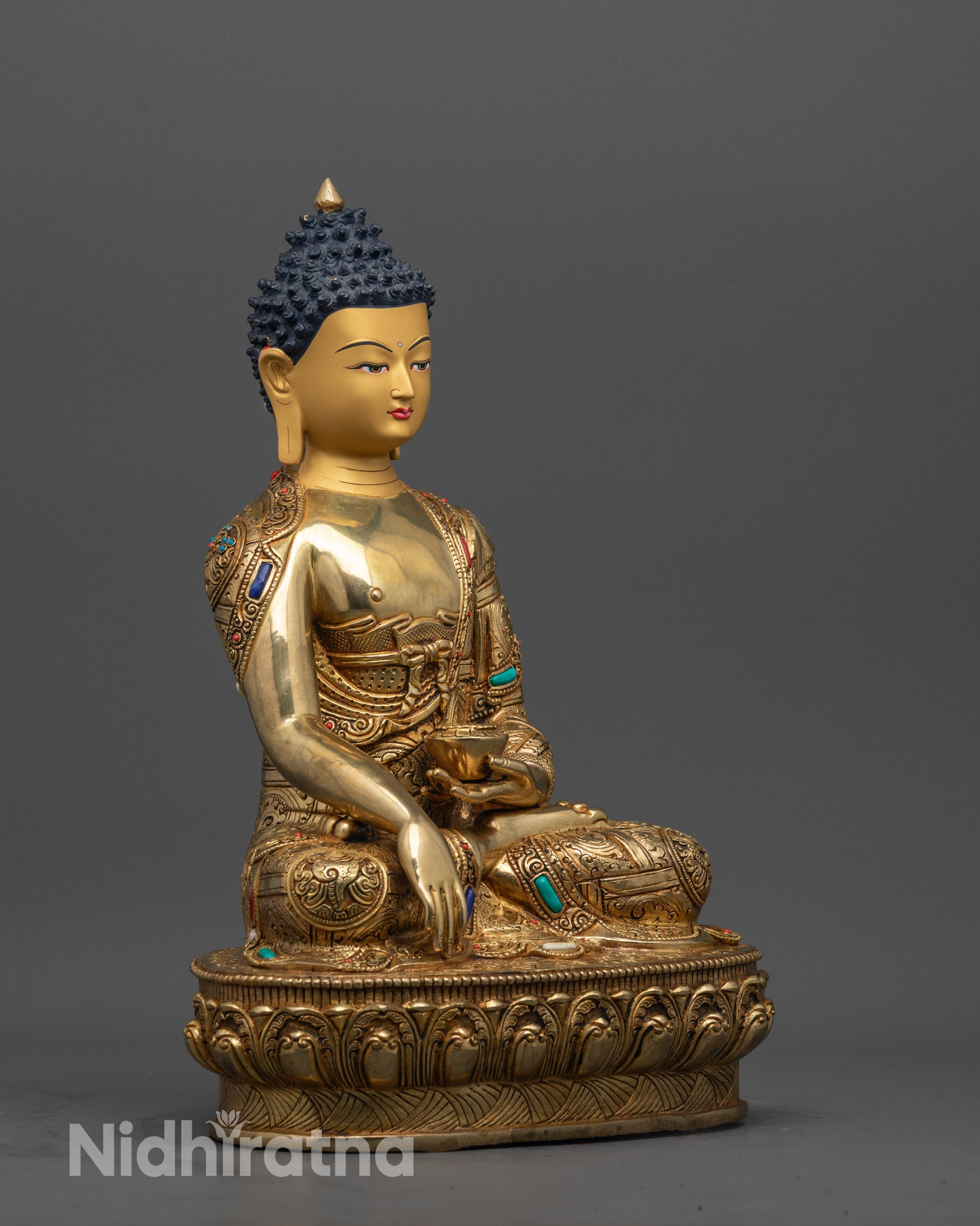 Side view of Shakyamuni Buddha holding alms bowl in Earth-touching gesture
