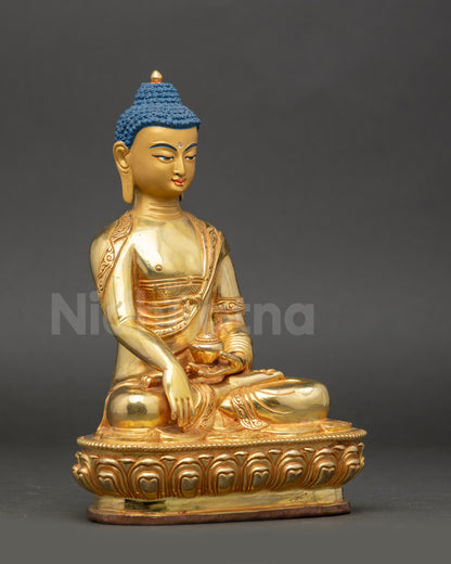 Side view of Shakyamuni Buddha statue holding begging bowl on lotus seat