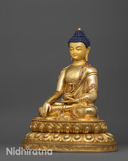 Side view of Shakyamuni Buddha statue showing bhumisparsha mudra and robe details