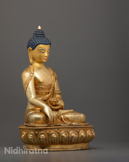 Side view of Shakyamuni statue with lotus base and intricate carvings