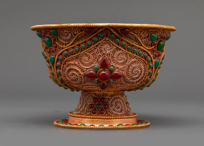 Side view of set of seven Water Offering Bowl highlighting gold filigree patterns
