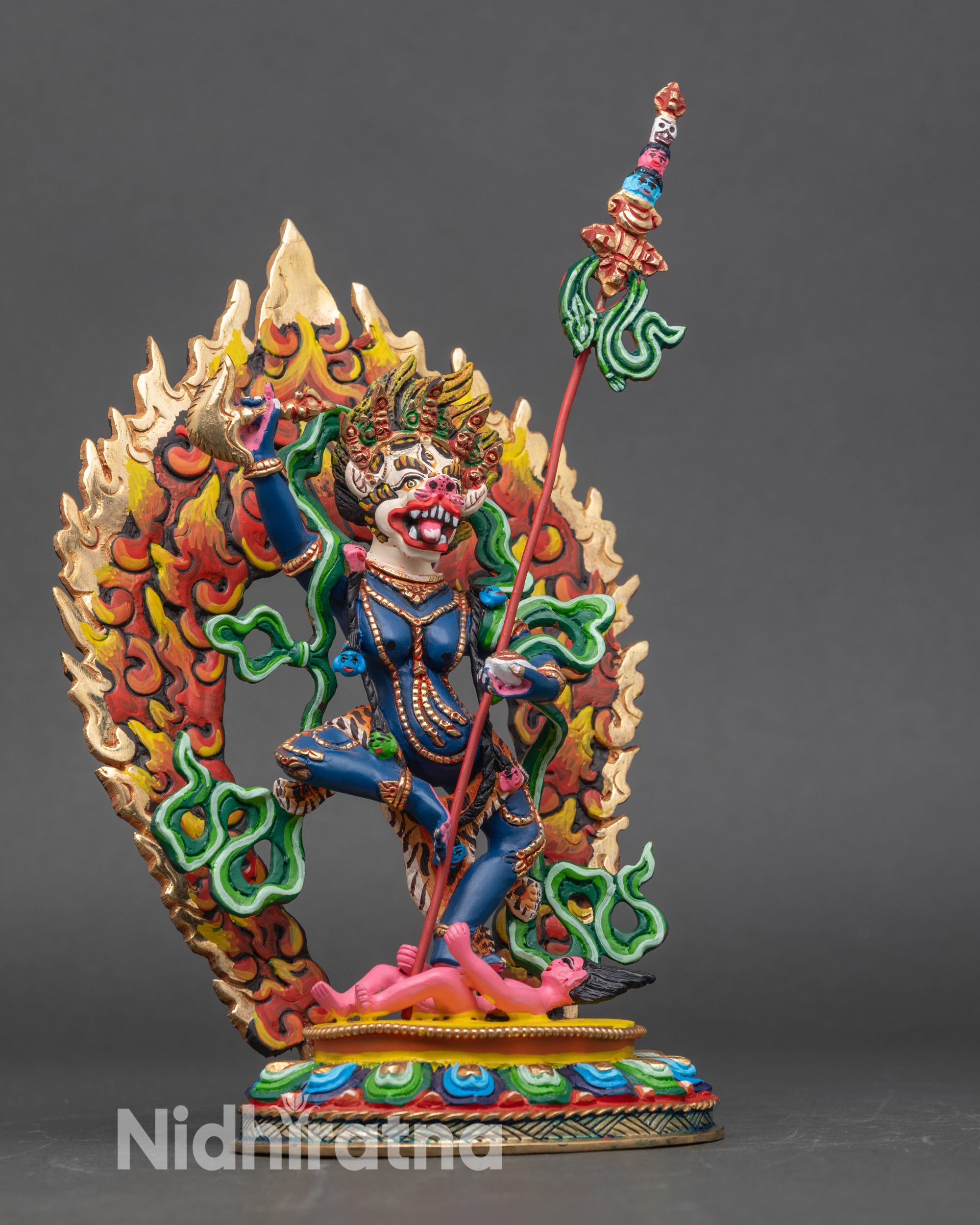 Side view of Simha Mukha standing on lotus seat, copper sculpture with premium acrylic colors