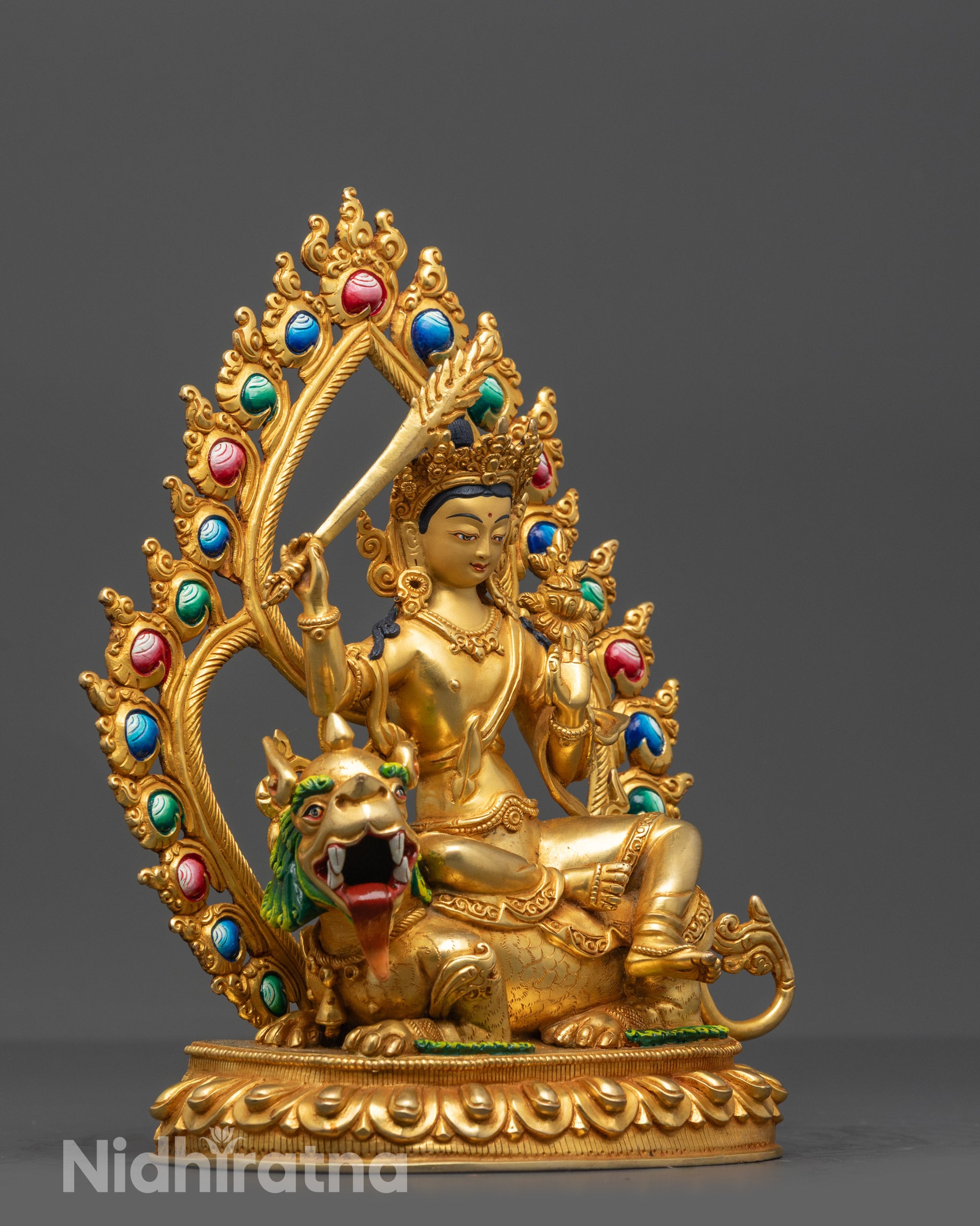 Side view of Simhada Manjushri holding wisdom sword and Prajnaparamita scripture