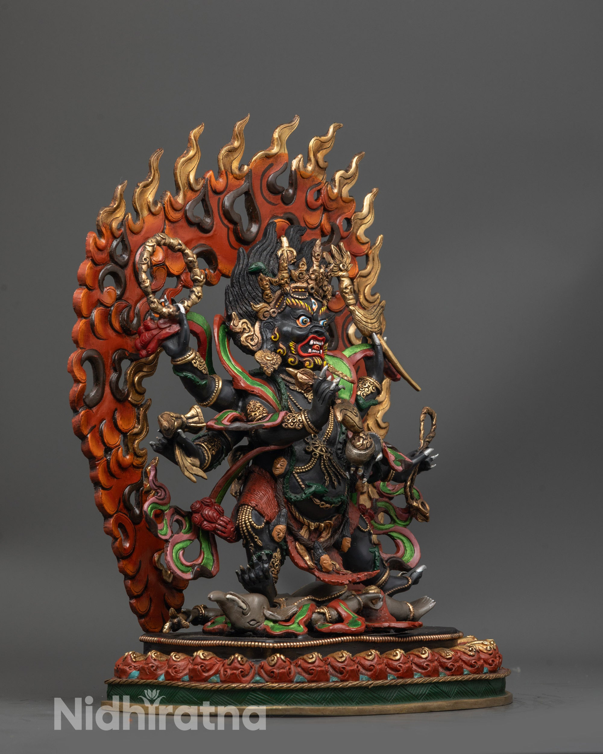 Side view of Six Armed Mahakala Statue | Wrathful protector deity with six arms