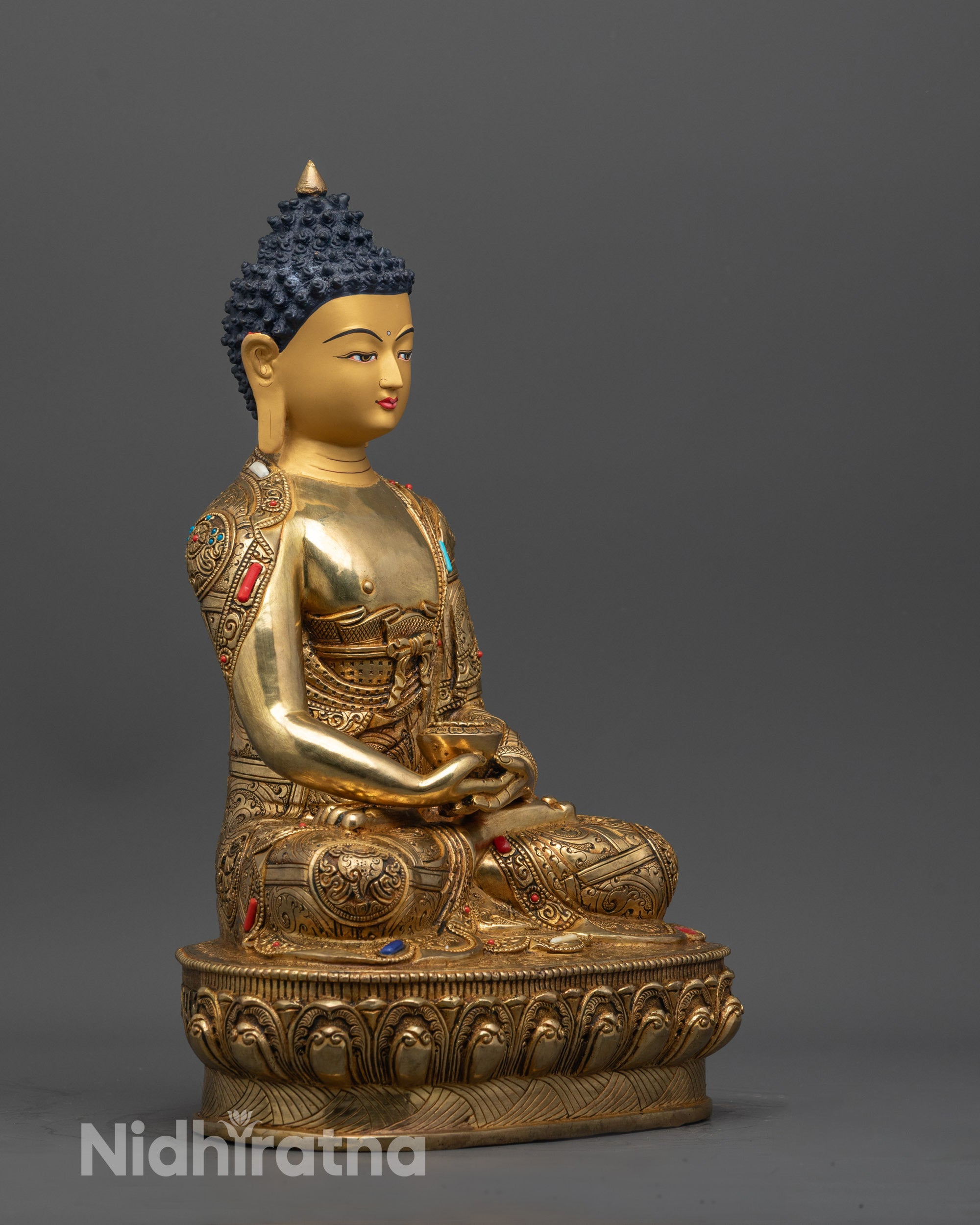 Side view of Tibetan Amitabha Buddha holding monk's bowl in Samadhi Mudra on lotus seat