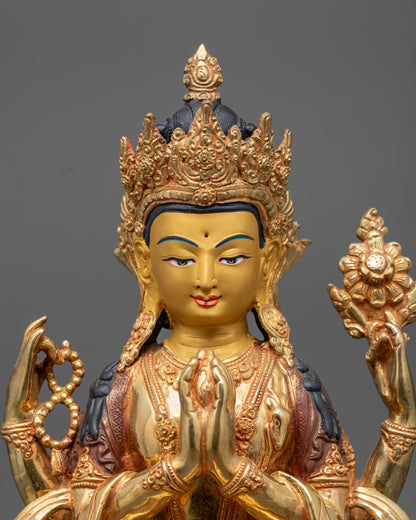 Tibetan Chenrezig Sculpture highlighting detailed hand-carving, acrylic colors, and multiple arms representing the Four Immeasurables.