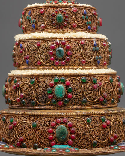 Side view of Tibetan Mandala Set highlighting copper body and colorful gemstones
