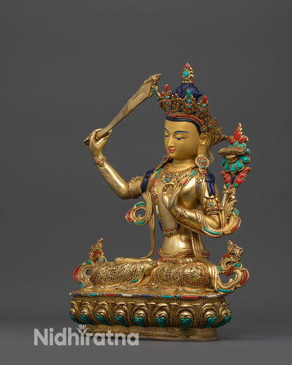 Side view of Tibetan Manjushri Sculpture with intricate swirling robes crafted by Newari artisans of Nepal.