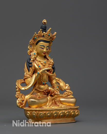 Side view of Tibetan Vajrasattva Statue highlighting flowing robes and mala beads
