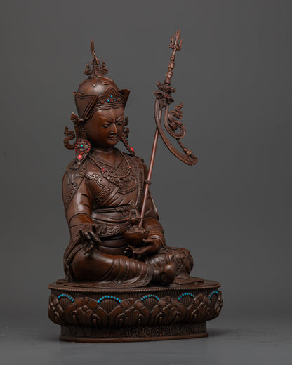 Side view of Traditional Himalayan Guru Rinpoche sculpture with detailed carvings