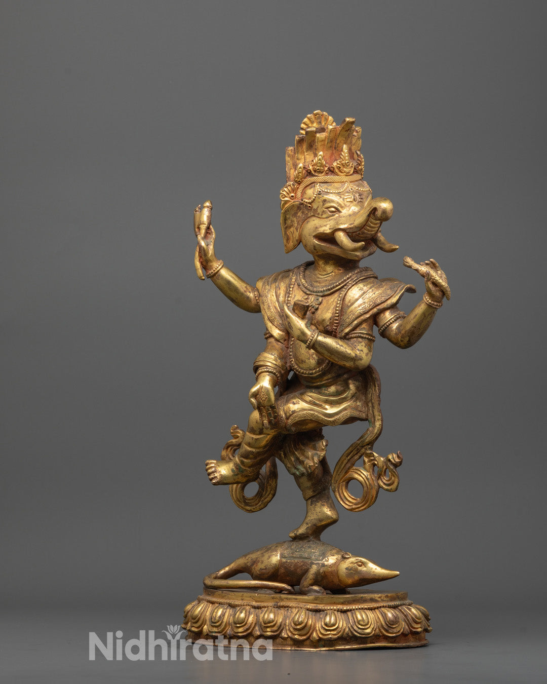 Side view of Traditional Lord Ganesha Idol with Symbolic Lotus Base and Divine Ornaments