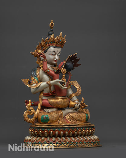 Side view of Union Dorje Sempa Yab-Yum statue on lotus seat
