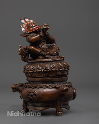 Side view of Vajradhaka Statue holding vajra, symbolizing fierce protection and wisdom