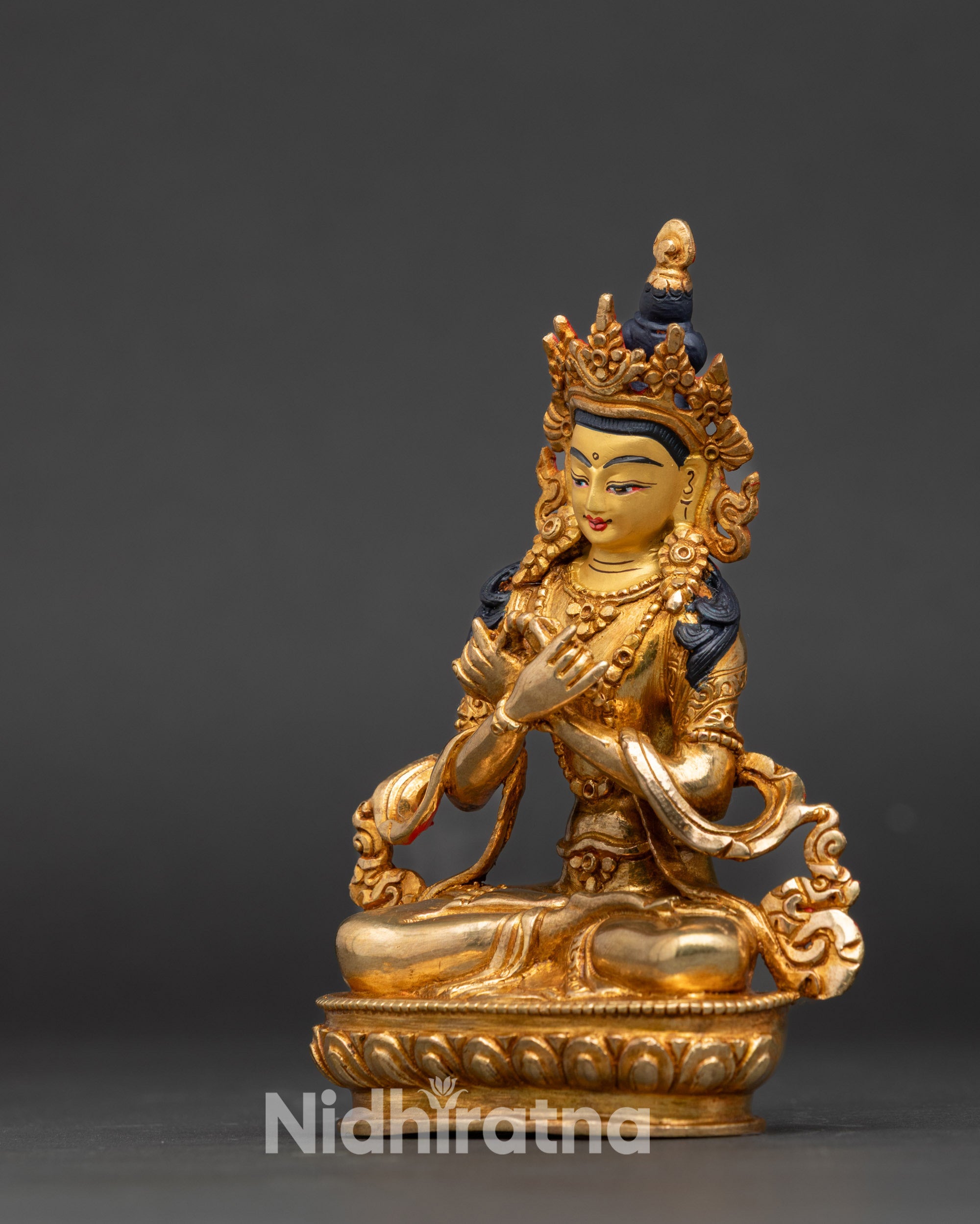 Side view of Vajradhara statue, traditional Nepalese lost-wax casting with intricate details