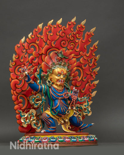 Side view of Vajrapani protector figure with dynamic stance and flame halo details