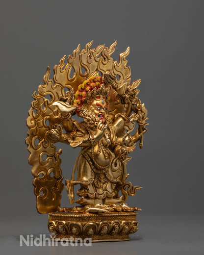Side view of White Six-Armed Mahakala statue featuring six arms holding sacred objects